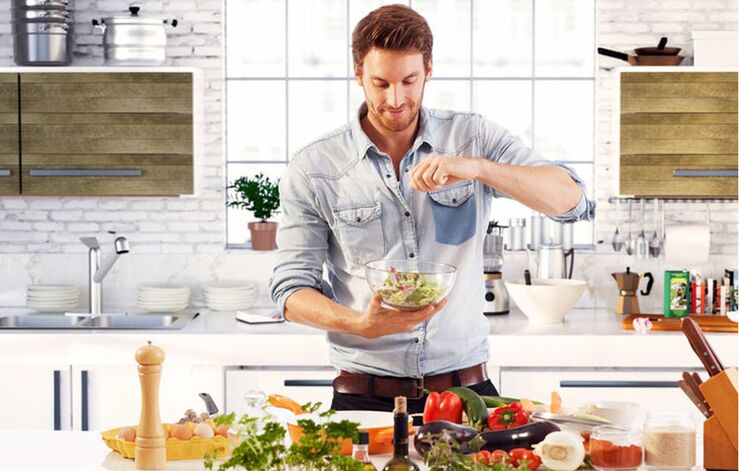 The man prepares a vegetable salad to increase potency